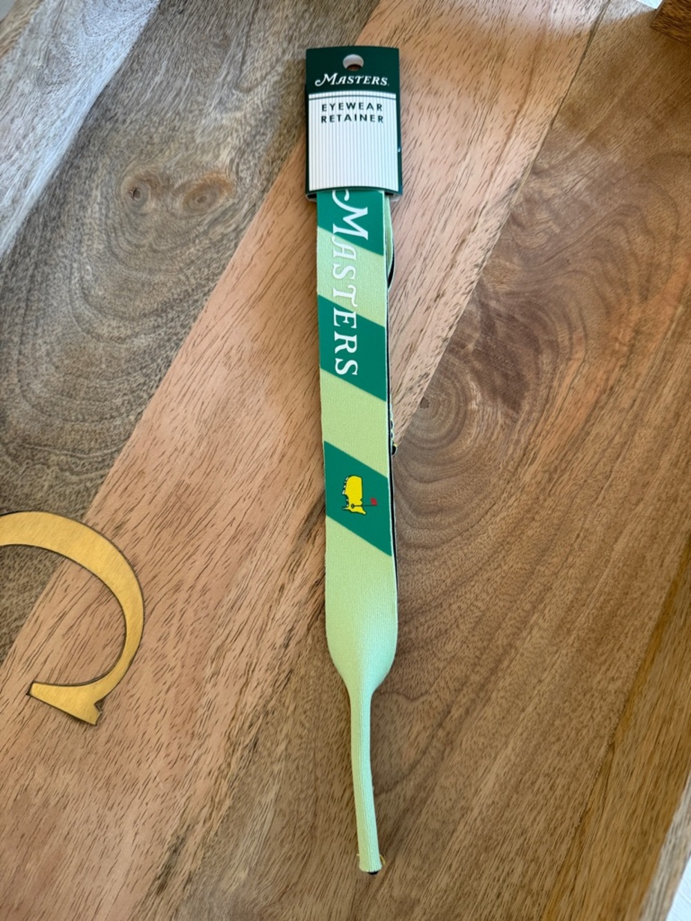 Masters 2026 Lime and Dark Green Eyewear Retainer with Yellow Logo